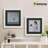White With Black Mount Picture Frame is hanging on a wall just over the Table