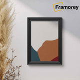 Swept Style Black Poster Frame hanging on a white wall.