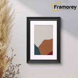 Swept Style White Picture Frame With Black Mount is hanging on a wall.