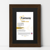 Walnut With Black wooden poster frame, flat texture, premium wall décor frame on a White surface standing with a wall
