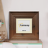 Big Step Style Walnut Wooden picture frame with ivory mount placed on a drawer.