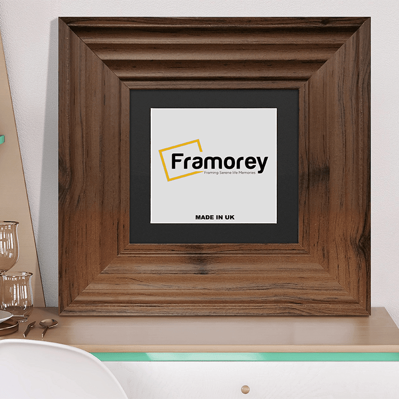 Big Step Style Walnut Wooden picture frame with black mount placed on a drawer.