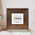 Big Step Style Walnut Wooden picture frame with white mount placed on a drawer.