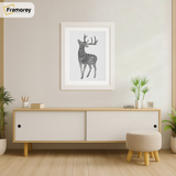 White Picture Frame hanging on a wall just over the Table
