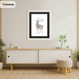 White Picture Frame With Black Mount hanging on a wall just over the Table