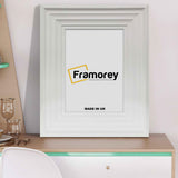 White Picture Frames Photo Frames placed on a table