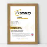 Oak picture frame shown from front view on a plain white surface standing with a wall