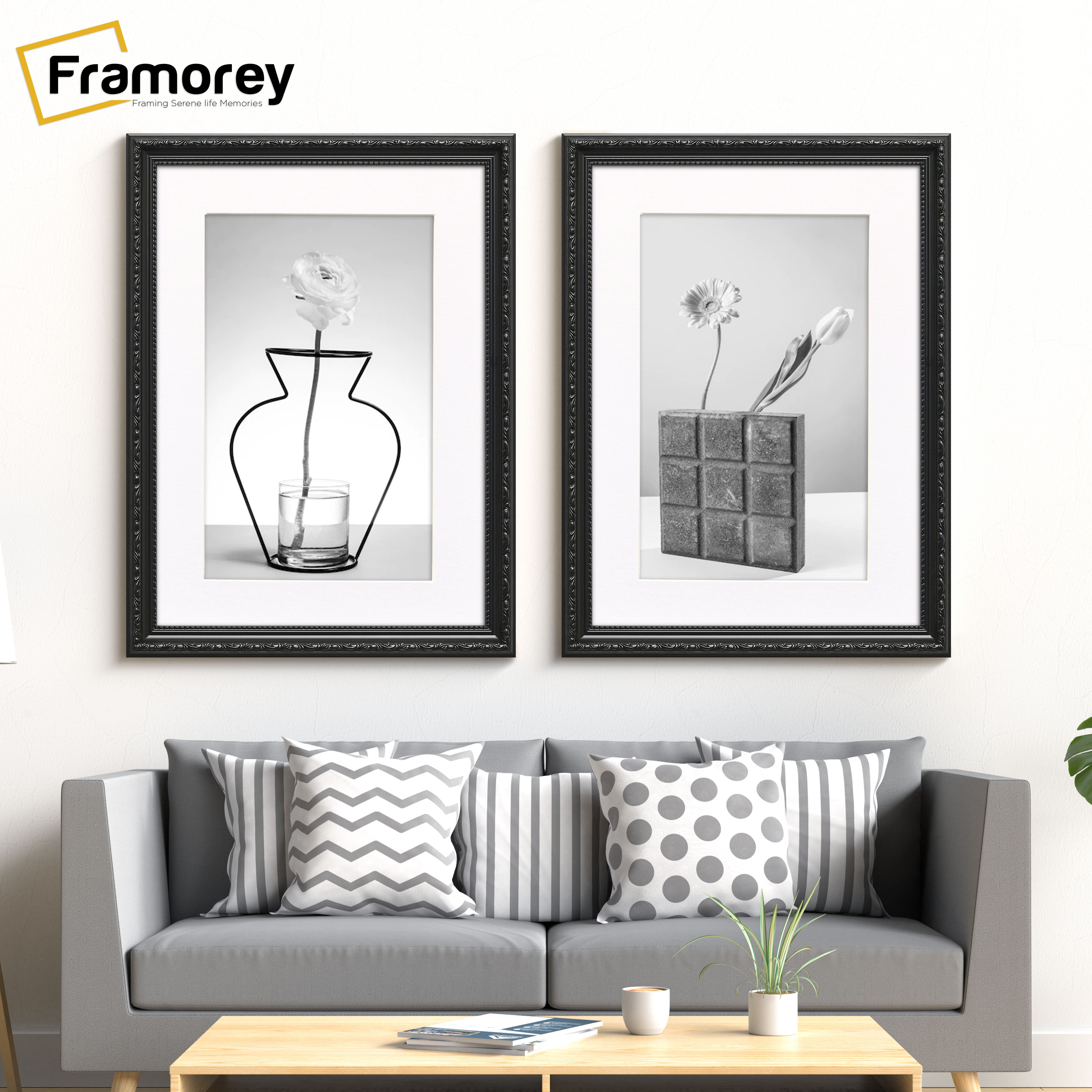 Two Black Picture Frames With White Mount hanging on a wall just over the Couch