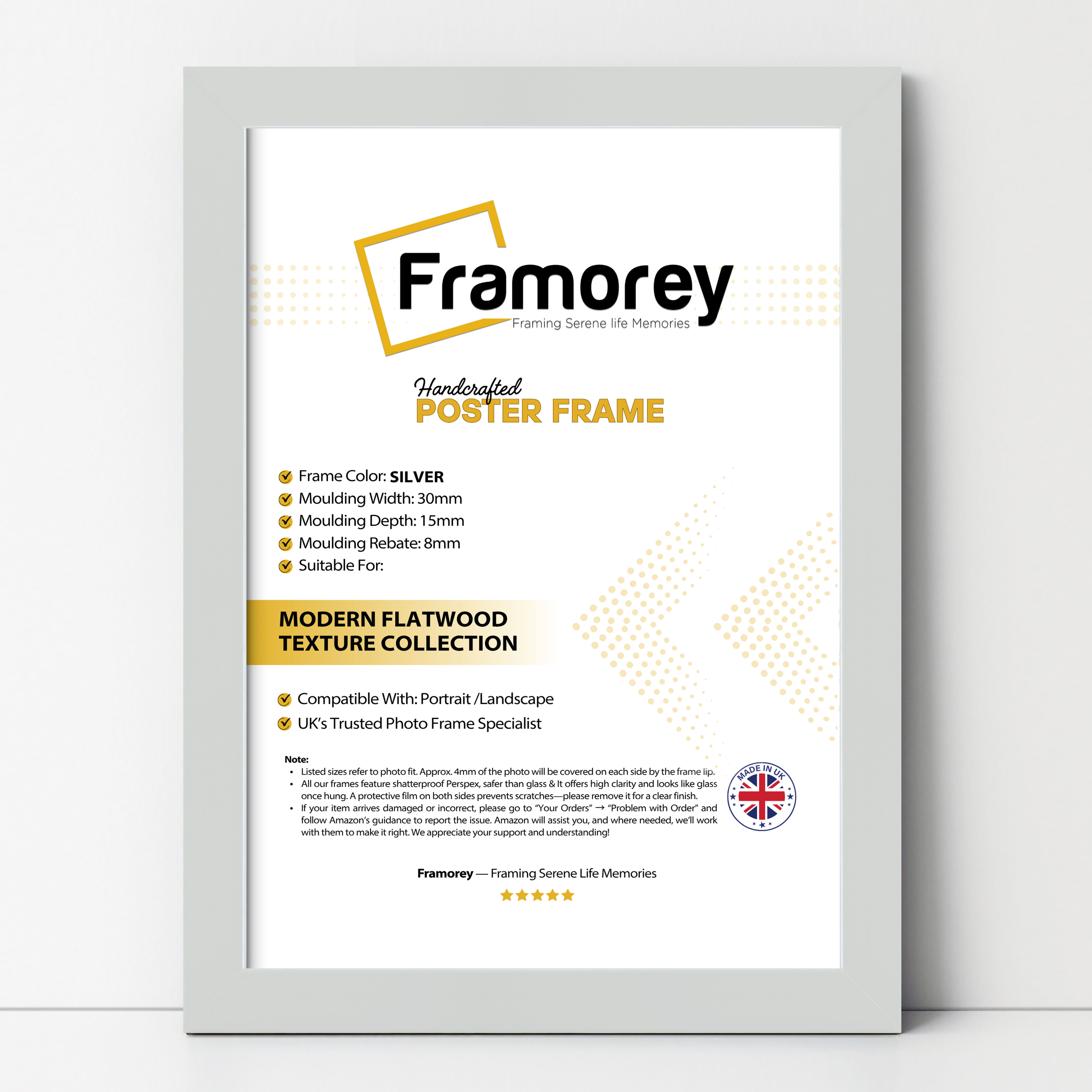 silver picture frame with no mount lean with the wall.