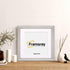 Silver Reverse Style poster frame with white mount with decorative things placed near it.