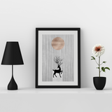 Front View of Black frame with Silver Bevel Cut Mount place on a wooden table with some decorative items place around it.